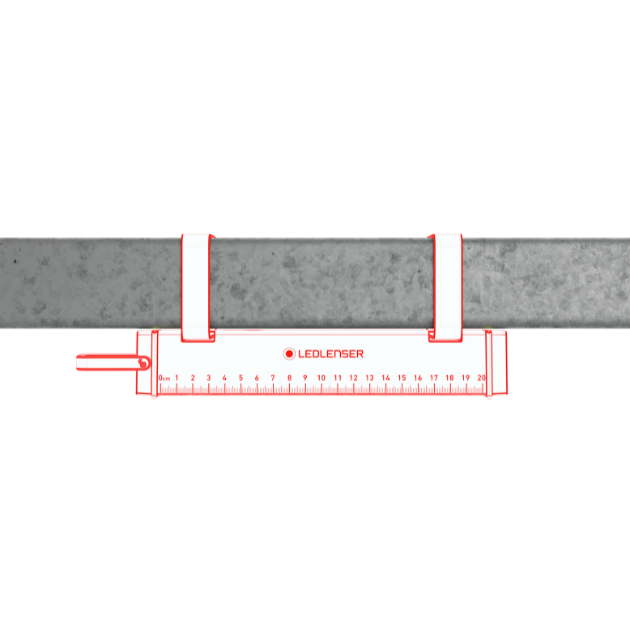 AF2R Work Area Light by Ledlenser red and white compact light mounted under a metal beam with a ruler for scale