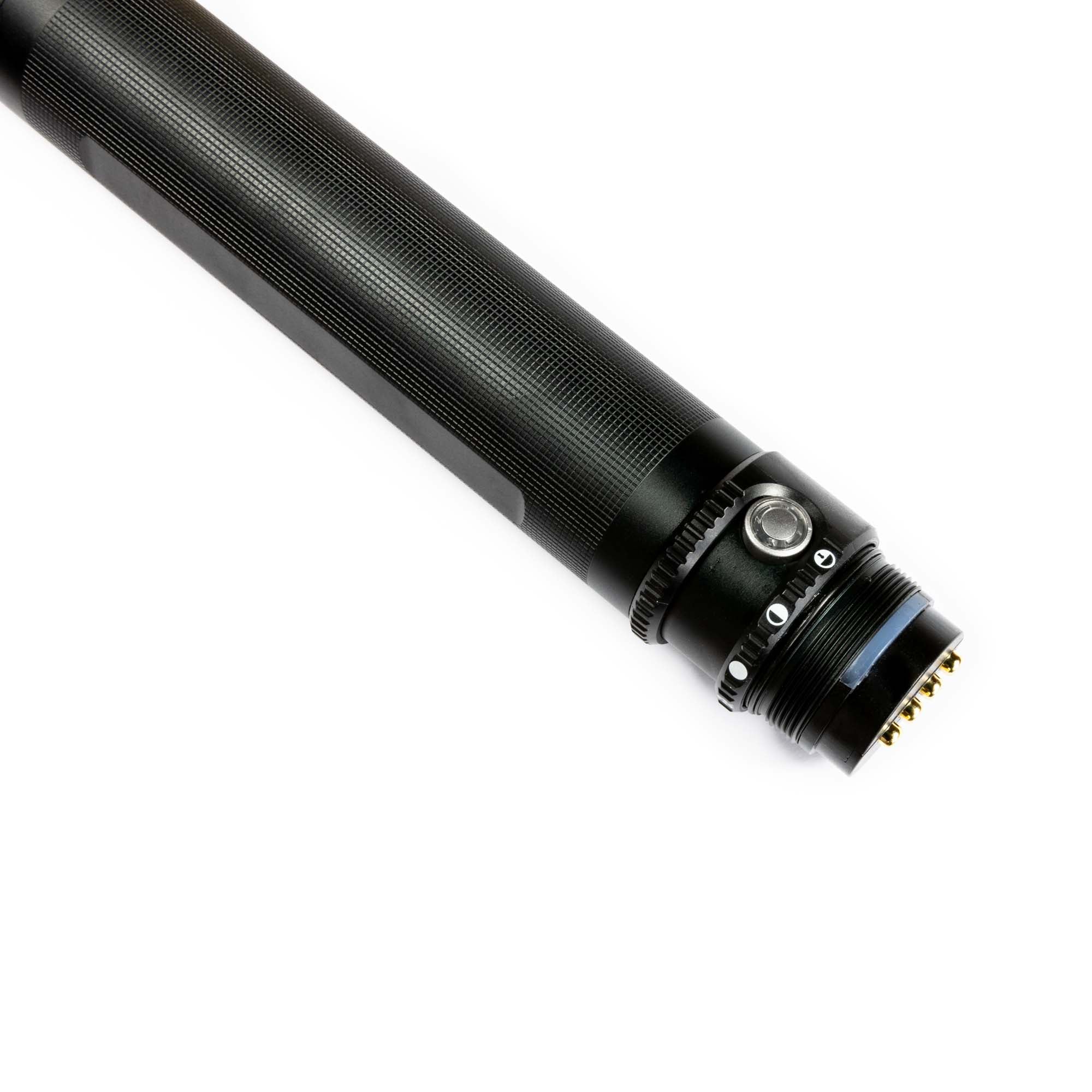 Ledlenser P17R Rechargeable Battery Tube in Aluminium Tube w Rearcap angled view showing black textured tube with end cap and gold pins