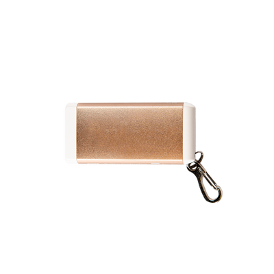 Ledlenser K6R Keychain Light compact rose gold rechargeable key ring lamp with metal clip attached and visible in image