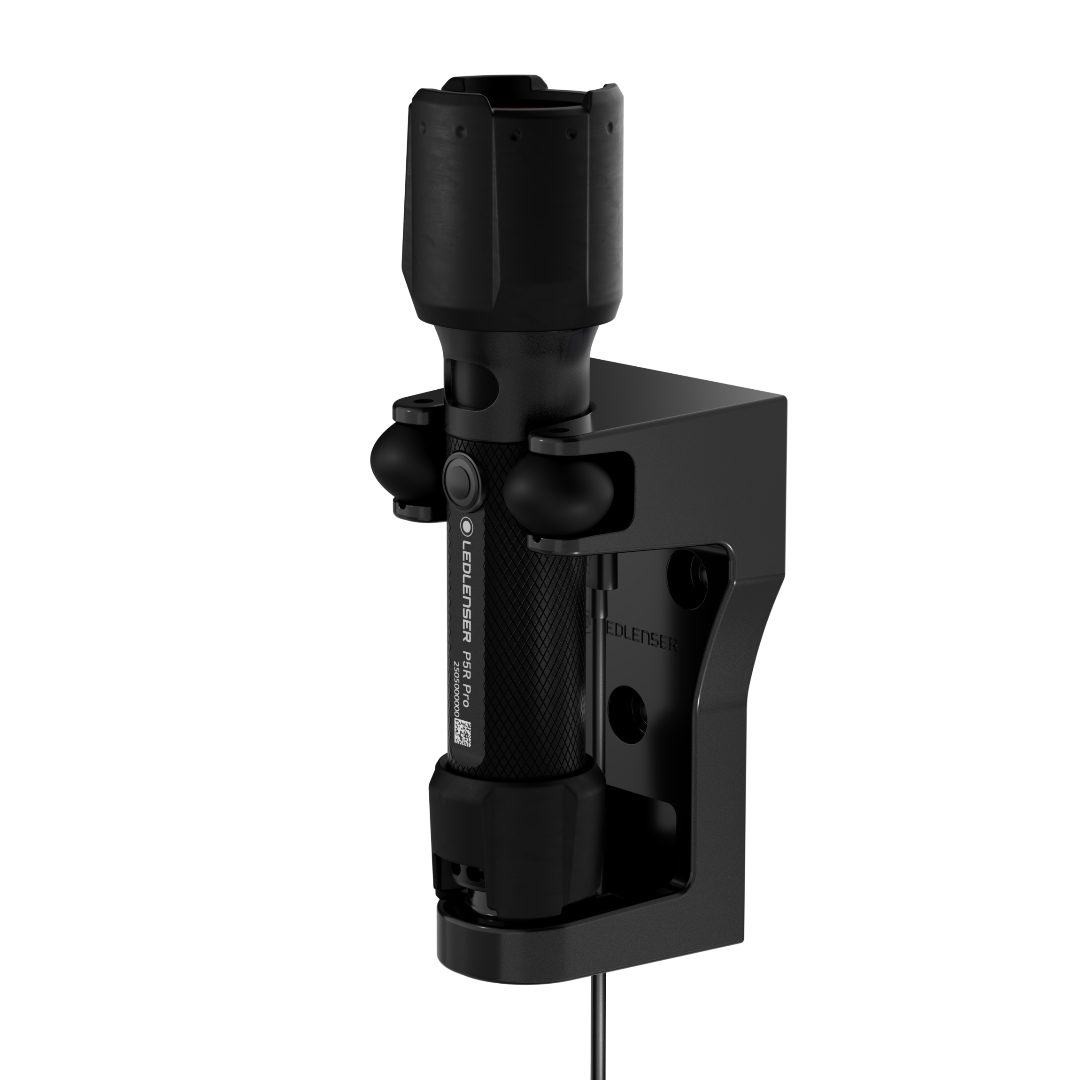 Ledlenser P5R Pro Torch mounted in a black clamp bracket for hands free use with vertical mounting surface visible