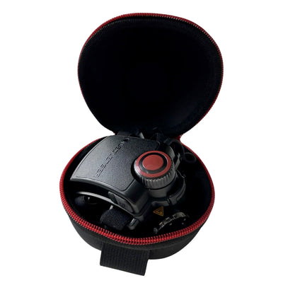 Ledlenser Hard Shell Accessory Pouch Type H opened case in black with red zipper housing a compact Ledlenser headlamp accessory inside