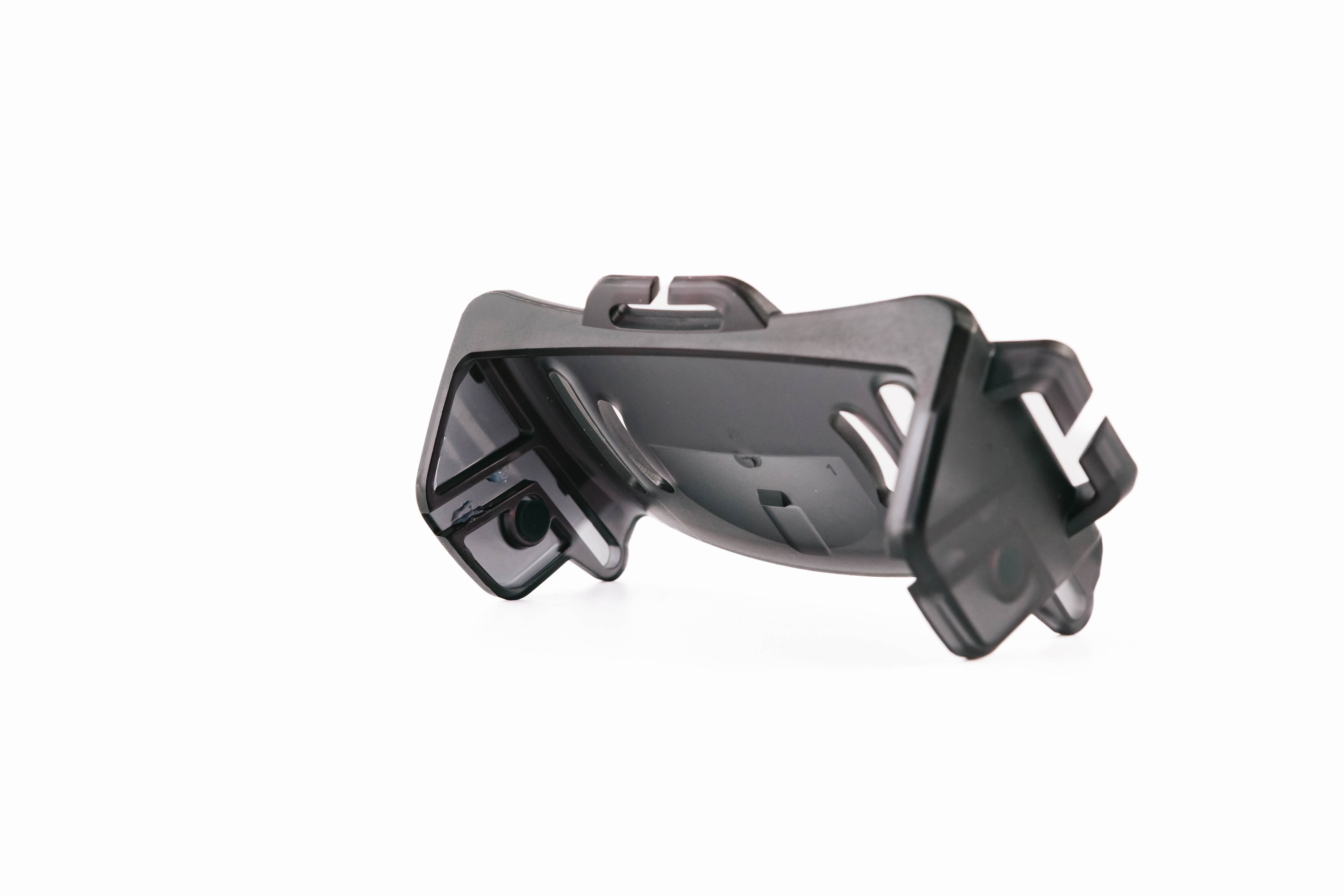 Ledlenser Spare Part Base Plate HF8R showing the black base plate component with mounting clips and polymer bag appearance