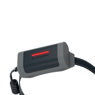 NEO9R Running Headlamp with dark blue body and grey housing red indicator light and adjustable head strap shown from a side angle