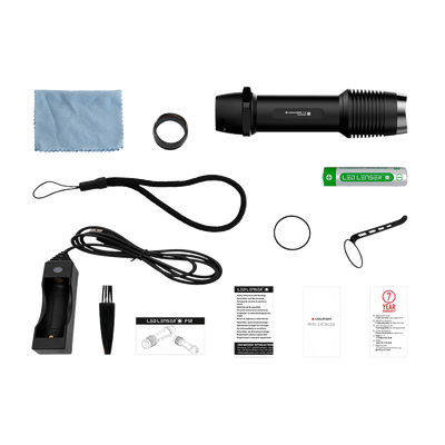 Ledlenser F1R Torch with accessories including rechargeable battery charging dock cable wrist lanyard cleaning cloth and manuals