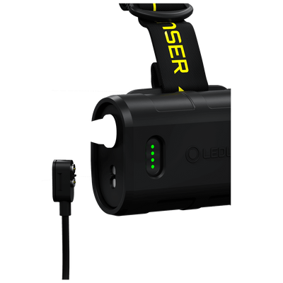 H15R Work Headlamp battery pack with green indicator LEDs and black strap marked Ledlenser viewed from the side with charging cable visible