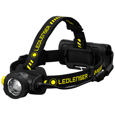 Ledlenser H15R Work Headlamp featuring black and yellow headband front flashlight module and rear battery pack on head strap