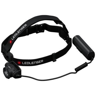 H7R Core Headlamp with black adjustable headband and attached battery pack connected by a coiled cord front mounted LED light