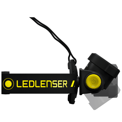 Ledlenser H7R Work Headlamp with black body and yellow dial shown in side view attached to an adjustable head strap