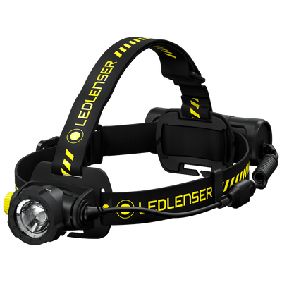 H7R Work Headlamp worn on head with black and yellow headband front lamp housing and rear battery pack visible