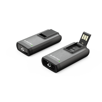 Ledlenser K6R 4GB Keychain Light showing two compact brushed gray keychain lights with a USB drive front lens and the connector extended on one unit