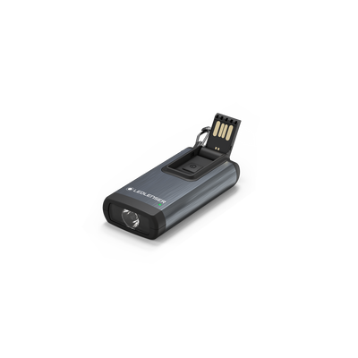 Ledlenser K6R Keychain Light showing USB charging module and attached key ring compact grey aluminum body with front lens