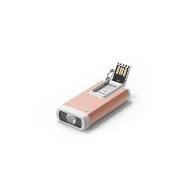 Ledlenser K6R Keychain Light pink body with white ends USB rechargeable pocket torch shown with key ring attachment