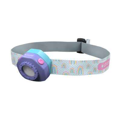 Kidled4R Headlamp by Ledlenser with purple front housing and pastel rainbow strap worn on head