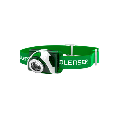 SEO3 Headlamp with green adjustable strap and white green housing shown worn on head
