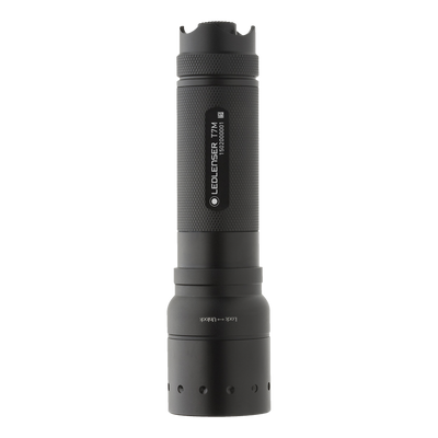 Ledlenser T7M Torch shown upright black knurled handheld flashlight with textured grip and tail cap