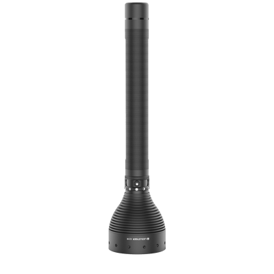 Ledlenser X21R torch standing upright with a tall black cylindrical body textured grip and ribbed base head design