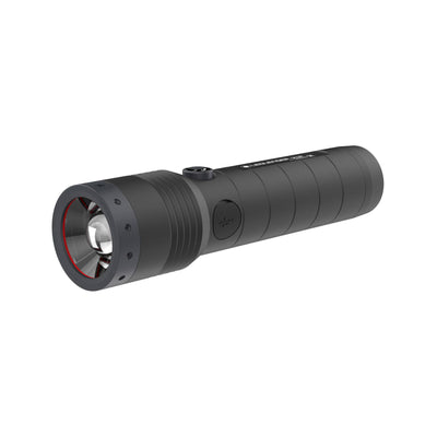 Ledlenser M6R Rechargeable Torch shown at a slight angle black compact flashlight with front lens red bezel ring and textured grip