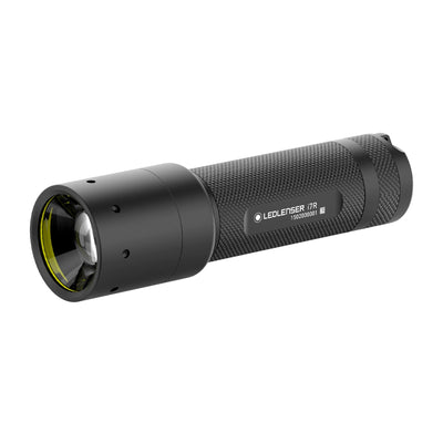 Ledlenser i7R Rechargeable Torch black with knurled grip and yellow ring around the lens angled handheld view