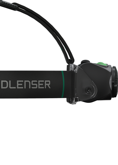 MH8 Black Rechargeable Headlamp shown in side view with adjustable head strap Ledlenser branding on strap and green accent button