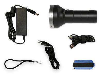 Ledlenser MT18 Rechargeable Torch with charging cable USB cable power adapter and spare battery pack in a black handheld design