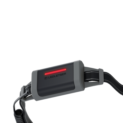 NEO5R Running Headlamp by Ledlenser featuring grey and black housing with red indicator strip and adjustable head strap