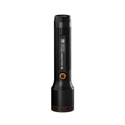 Ledlenser P5R Core Torch standing upright with a textured black body orange ring button and brown base cap visible