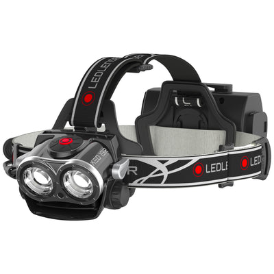 XEO19R Rechargeable Headlamp by Ledlenser showing dual front LEDs rugged black housing and adjustable headband