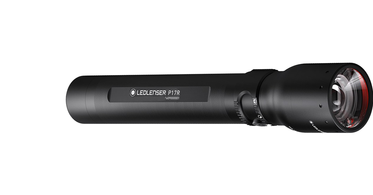 Ledlenser P17R rechargeable torch laid horizontally black metal body with textured grip and front lens with red bezel